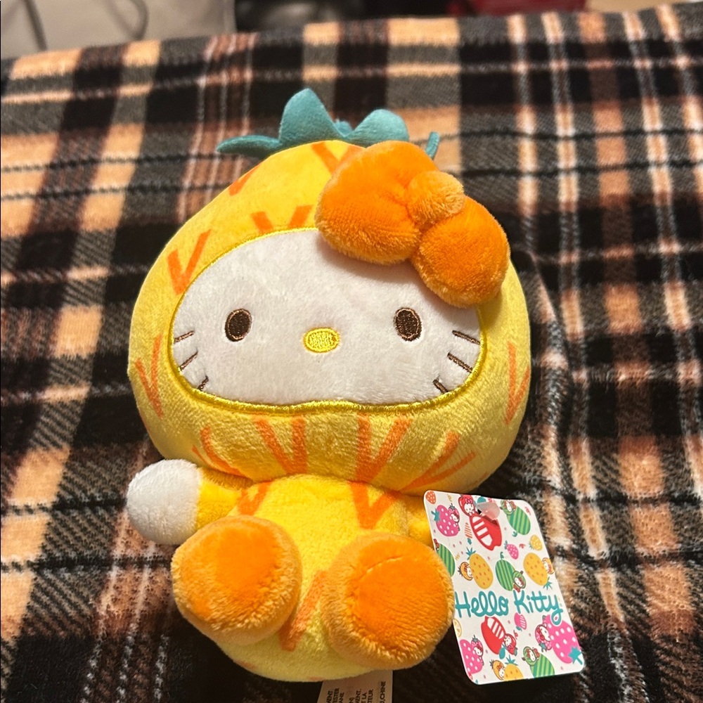 Hello Kitty in Vibrant Yellow and Orange Outfit